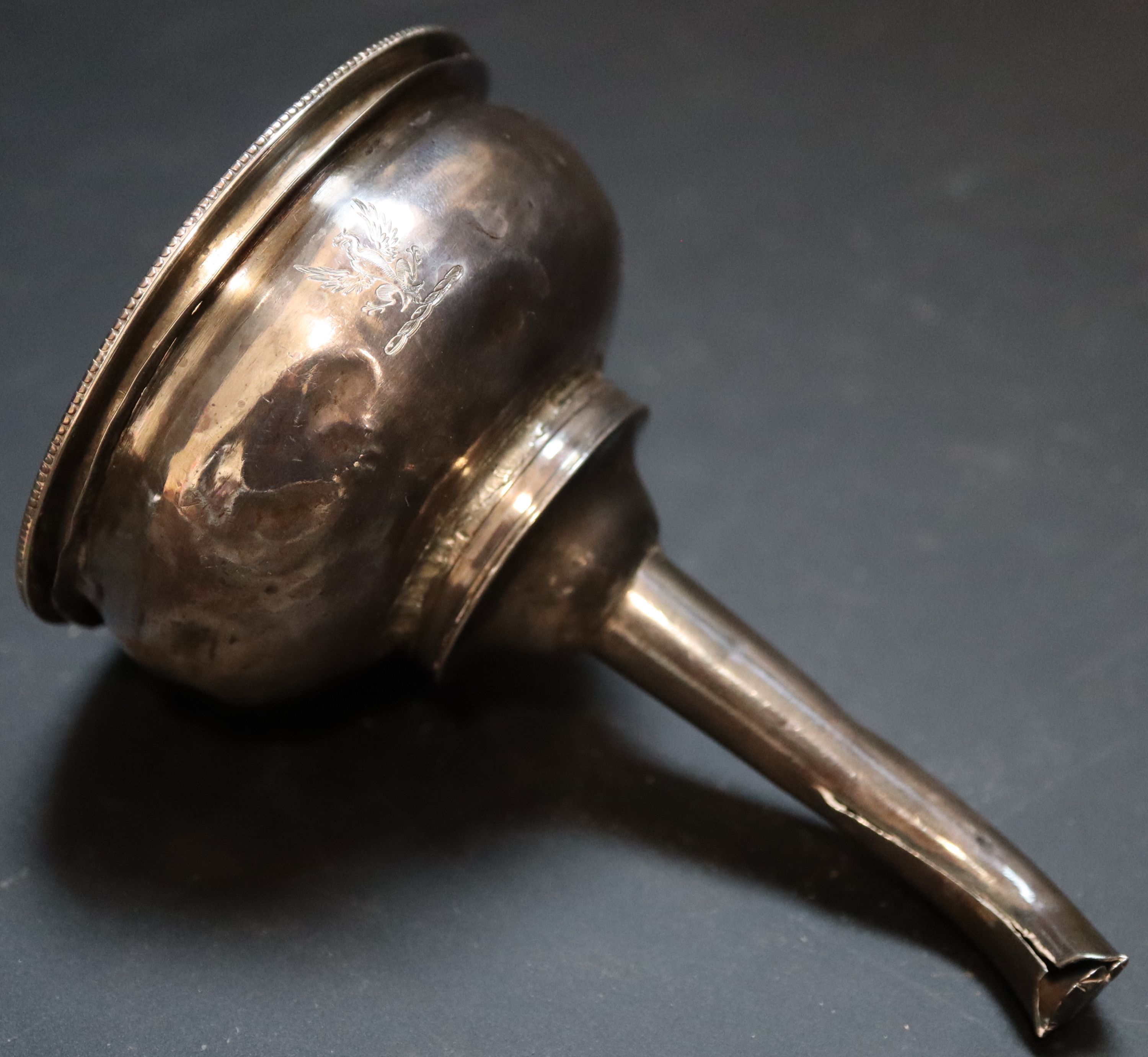 A George III silver wine funnel, 11.7cm, 90 grams (a.f.).